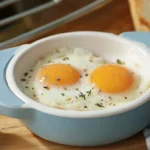 Microwave Egg Poacher With A Perfectly Poached Egg On A Kitchen Counter