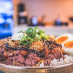 Ground Beef Bulgogi served with rice and green onions